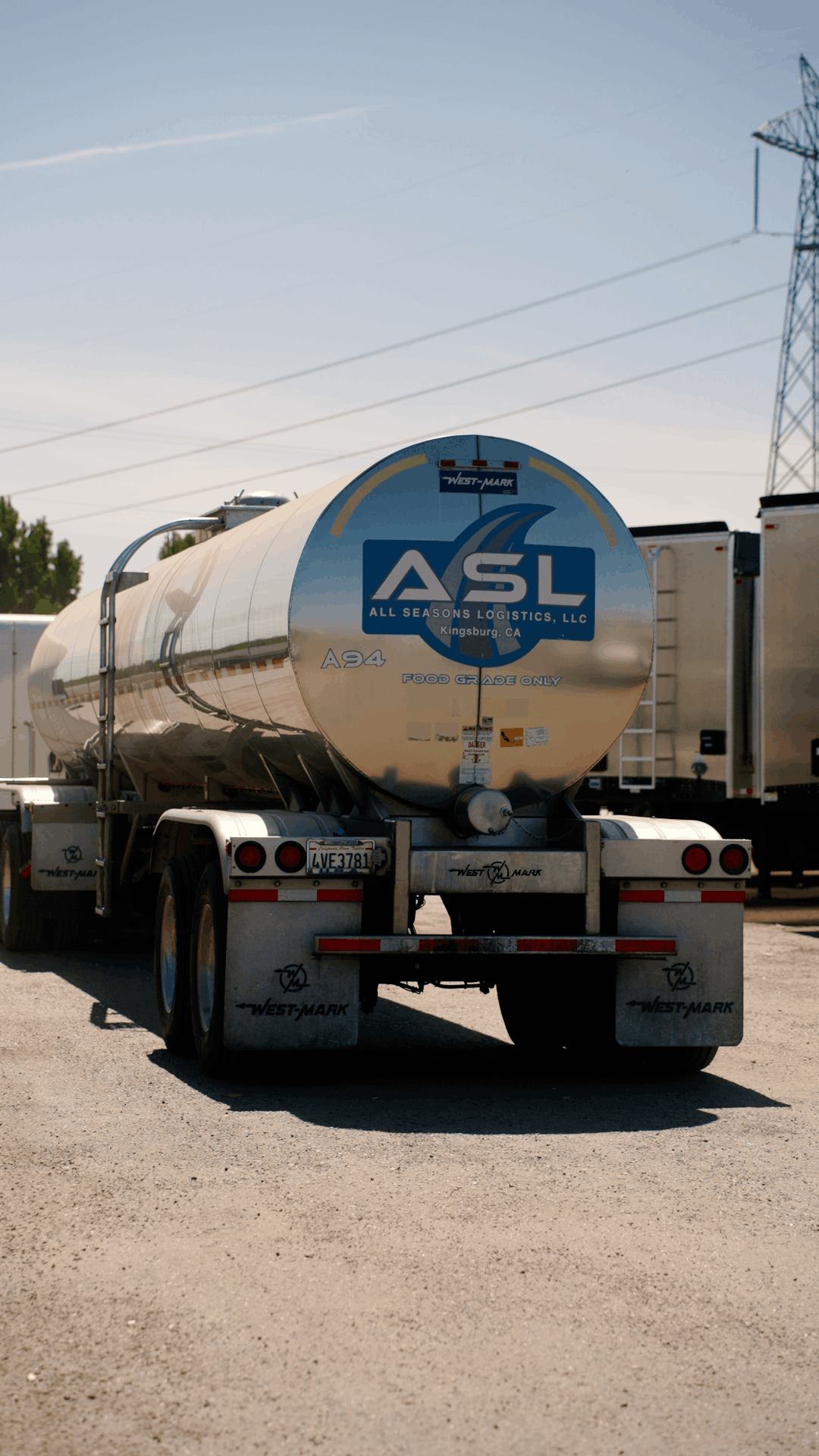 Rear view of an All Seasons Logistics food-grade milk tanker